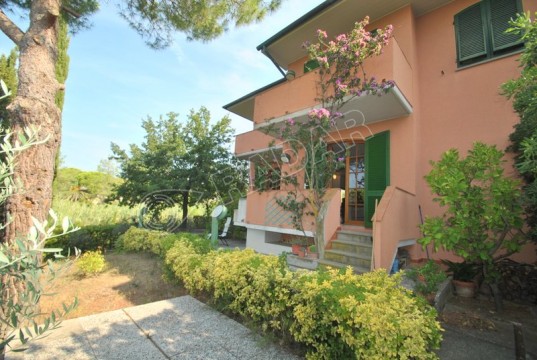 terraced house with garden in a hilly area 